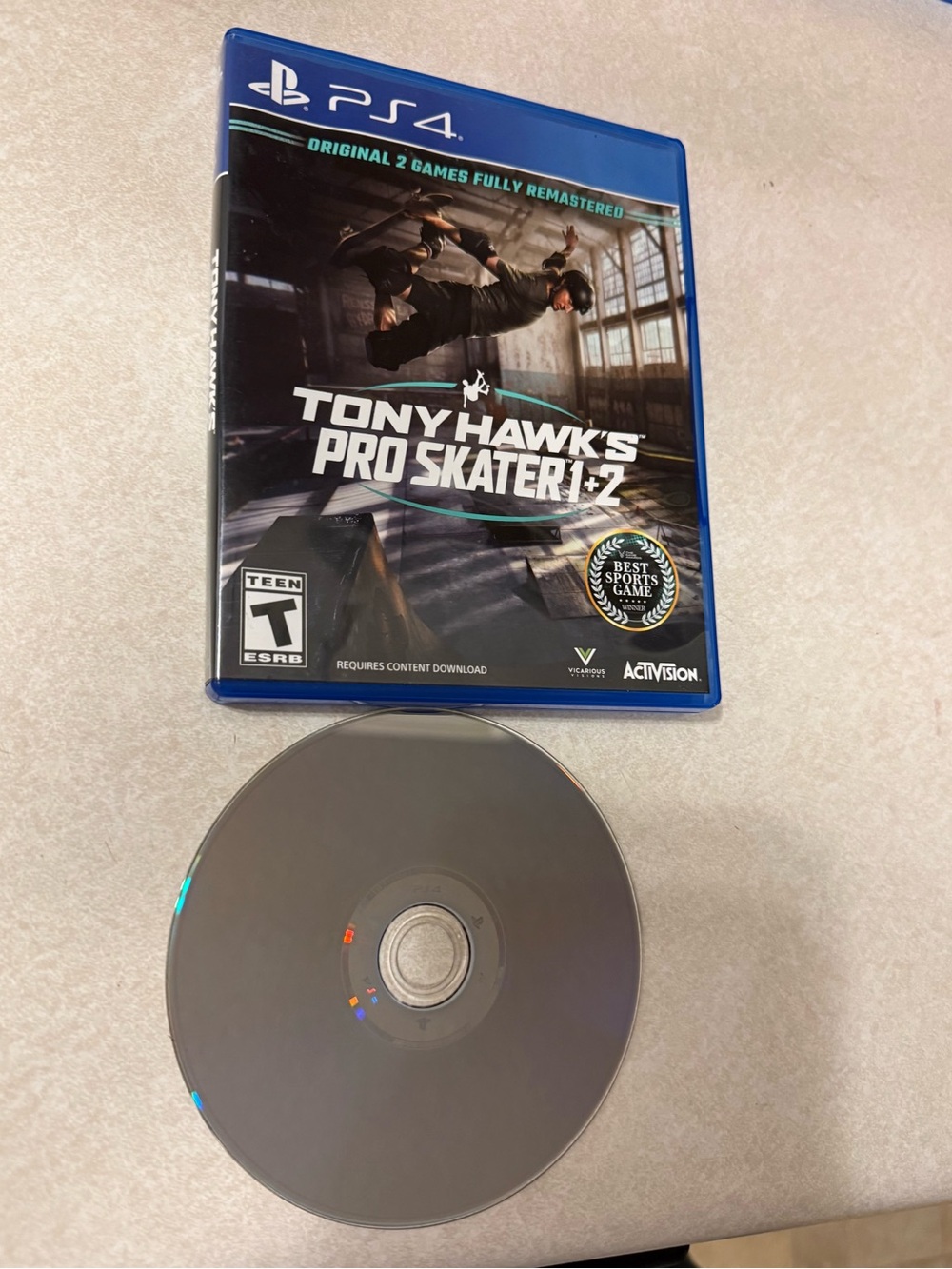 Tony Hawk's Pro Skater 1+2 (PS4) - PlayStation Blue Case